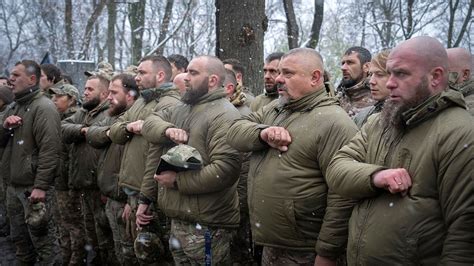 Ukrainian Soldiers Forced to Jump Over Dimmed Campfires During Physical Training